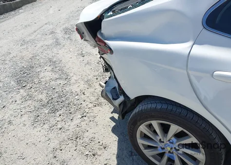 2021 Toyota Camry Le from USA, damaged, VIN 4T1C11AKXMU572963